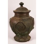 A 19TH / 20TH CENTURY CHINESE BRONZE VASE & COVER, with panels of birds and animals, the base with