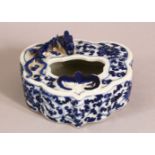 A CHINESE BLUE AND WHITE PORCELAIN BRUSH WASH, with dragon and bat, 11cm x 10cm.