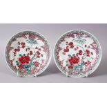 A PAIR OF 19TH CENTURY CHINESE FAMILLE ROSE DISHES, each decorated with floral decoration in