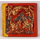 AN UNUSUAL CHINESE LACQUERED CARVED WOOD PANEL, the panel carved with kylin and phoenix, possibly
