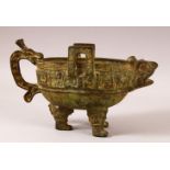 A CHINESE ARCHAIC STYLE TWIN HANDLE LIBATION / POURING VESSEL - with archaic style decoration in the