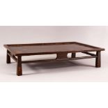 A SMALL CHINESE LOW WOOD TABLE - 31cm x 46cm