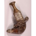 AN YEMEN WHITE METAL & RHINO HORN HANDLE JAMBIYA DAGGER - With moulded white metal mounts, with a