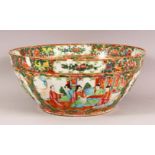 A 19TH CENTURY CHINESE CANTON FAMILLE ROSE PORCELAIN BOWL - with panel decoration of figures, flora,