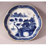 AN 18TH CENTURY CHINESE BLUE & WHITE PORCELAIN LANDSCAPE DISH - With molded rims and a landscape