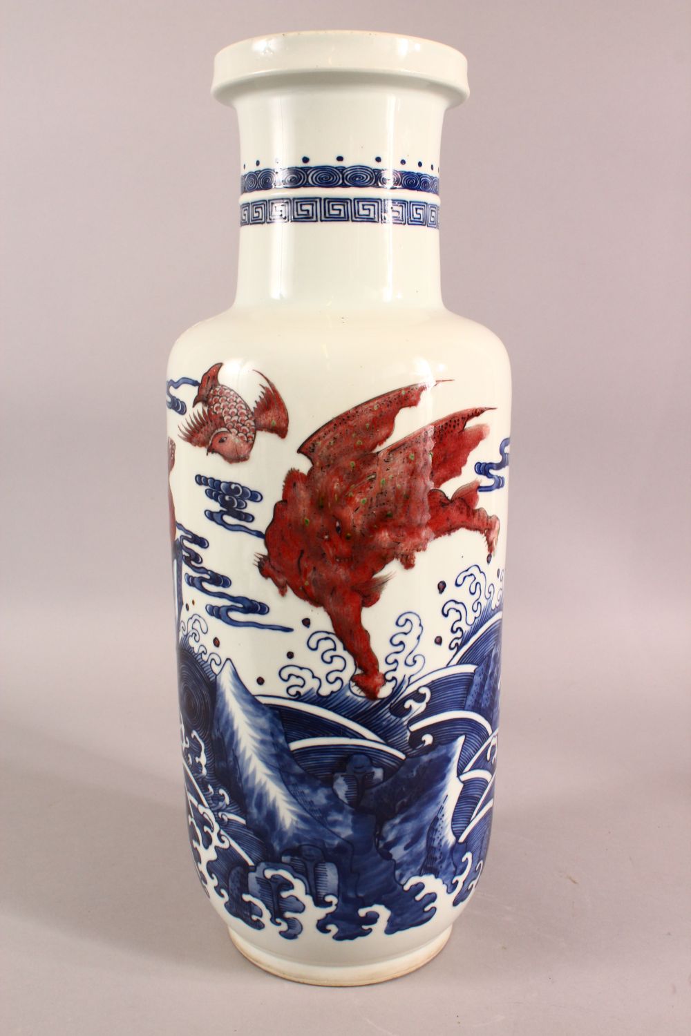 A CHINESE IRON RED, BLUE AND WHITE VASE, the body painted with mythical creatures amongst stylised - Image 5 of 7