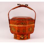 A CHINESE LACQUER LIDDED BASKET & COVER - decorated with scenes of figures amongst flora, with a