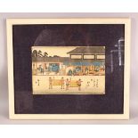 A JAPANESE FRAMED WOOD BLOCK PRINT - depicting figures in village life, 58cm x 48cm