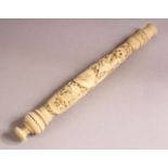 A 19TH CENTURY CHINESE CANTON CARVED IVORY PARASOL HANDLE - carved in deep relief depicting
