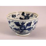 A SMALL CHINESE BLUE AND WHITE BOWL, painted with fish and flora, 12cm diameter, 7.5cm high.