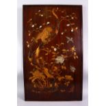 A JAPANESE MEIJI PERIOD GOLD LACQUER SHIBAYAMA PANEL, depicting a hawk upon a tree looking down at