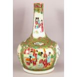 A 19TH CENTURY CHINESE CANTON FAMILLE ROSE PORCELAIN BOTTLE VASE - with panel decoration of figures,