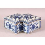 A CHINESE MING STYLE BLUE & WHITE PORCELAIN LIDDED DRAGON BOX, decorated with dragons and lotus,