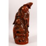 A CHINESE CARVED BAMBOO FIGURE OF TWO FIGURES - 34CM