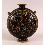 A SMALL JIZHOU KILN POTTERY MOON VASE, 21cm high, 18cm wide.