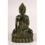 A THAI CARVED GREEN HARDSTONE BUDDHA, 13cm high.