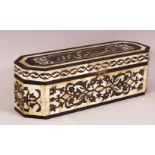 AN OTTOMAN TURKISH MOTHER OF PEARL INLAID LIDDED PEN BOX - with a hinged lid, the top with carved