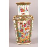 A 19TH CENTURY CHINESE CANTON FAMILLE ROSE PORCELAIN VASE - with panel decoration of figures, flora,