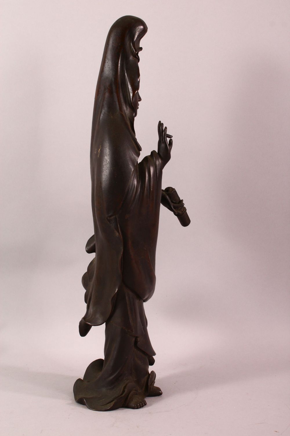 A CHINESE BRONZE FIGURE OF GUANYIN holding a scroll, her other hand raised in a mindfulness gesture, - Image 2 of 8