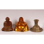 A SMALL BRONZE BUDDHA, together with two other metal items, buddha 9cm high.