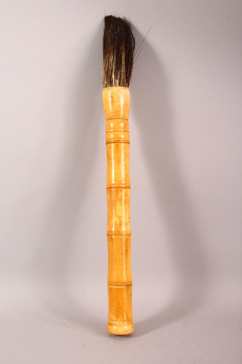 A LARGE CHINESE BONE HANDLED CALLIGRAPHY BRUSH, 50cm long. - Image 2 of 4