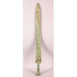 A CHINESE ARCHAIC STYLE BRONZE SWORD, the blade incised with calligraphy and border decoration in