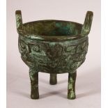 A CHINESE ARCHAIC STYLE TWIN HANDLE CENSER & STAND - with archaic style decoration and wooden