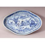 A CHINESE BLUE & WHITE PORCELAIN LANDSCAPE DISH - 19cm wide.