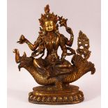 A BRASS STATUE OF VISHNU MATSYA, the figure inset with semi precious stones, 26cm high, 23cm at