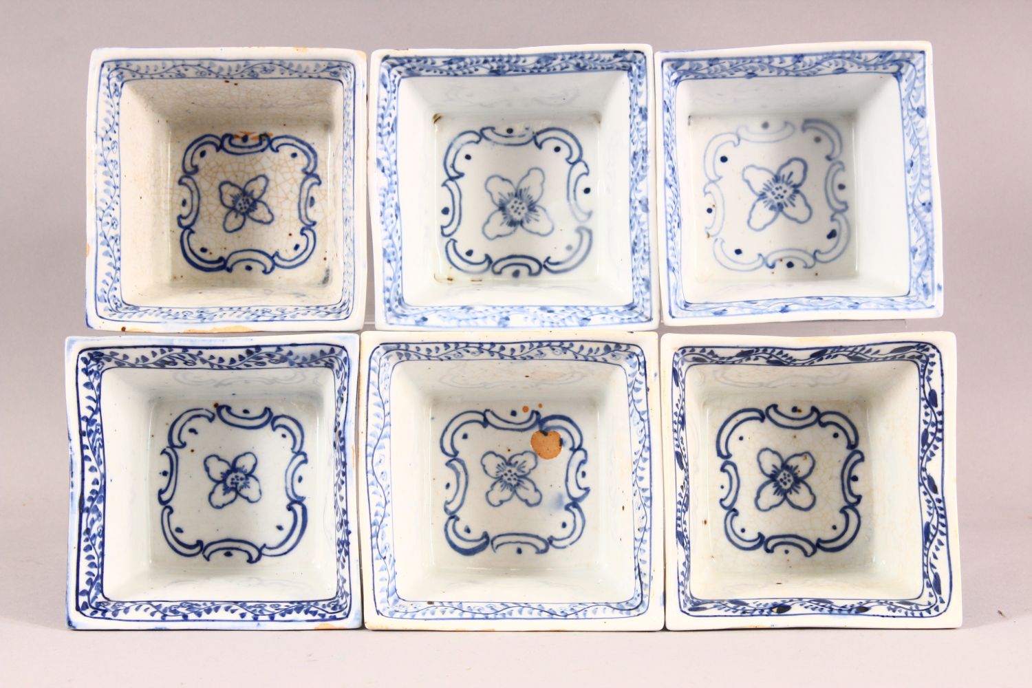 SIX DECORATIVE CHINESE BLUE AND WHITE SQUARE FORM BOWLS, each painted with flowers, the inner rims - Image 2 of 3