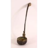 AN ARCHAIC STYLE BRONZE LADLE, the handle with dragon-like head, the foot of the handle with praying