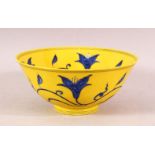 A CHINESE YELLOW GROUND PORCELAIN FLORAL BOWL - yellow ground with blue floral decoration, the