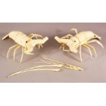 A JAPANESE CARVED IVORY RETICULATED MODEL OF A CRAYFISH, and another, 29cm long (2).