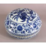 A GOOD CHINESE BLUE AND WHITE PORCELAIN BOX AND COVER, the cover decorated with birds on a peach