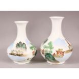 A PAIR OF CHINESE EGGSHELL VASES, one slightly taller than the other, 14cm and 13cm.