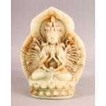 A LARGE CHINESE CARVED JADE FIGURE OF THOUSAND ARM GUANYIN DEITY, seated upon a lotus base with