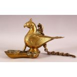 AN INDIAN BRASS HANGING LAMP in the form of a parrot, the hinged well in the form of the feet.