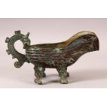 A CHINESE ARCHAIC STYLE TWIN HANDLE LIBATION CUP - with archaic style decoration - 11cm x 22cm