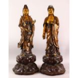 A LARGE PAIR OF CHINESE GILT BRONZE FIGURES OF DEITYS - one of guanyin, the other of buddha, both in