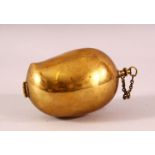 A 19TH CENTURY INDIAN BRASS LADIES FRUIT FORMED MAKEUP BOX - the interior with a mirror and