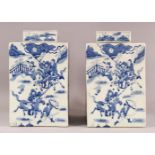 A LARGE PAIR OF CHINESE BLUE & WHITE SQUARE FORMED CADDY & COVERS, each decorated with scenes off