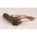 A SILVER AND CORAL BEAD SCROLL VESSEL, the vessel with a coral bead at each end and chain,