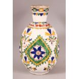 A TURKISH KUTHAYA POTTERY VASE - with floral motif panel decoration - 17.5cm