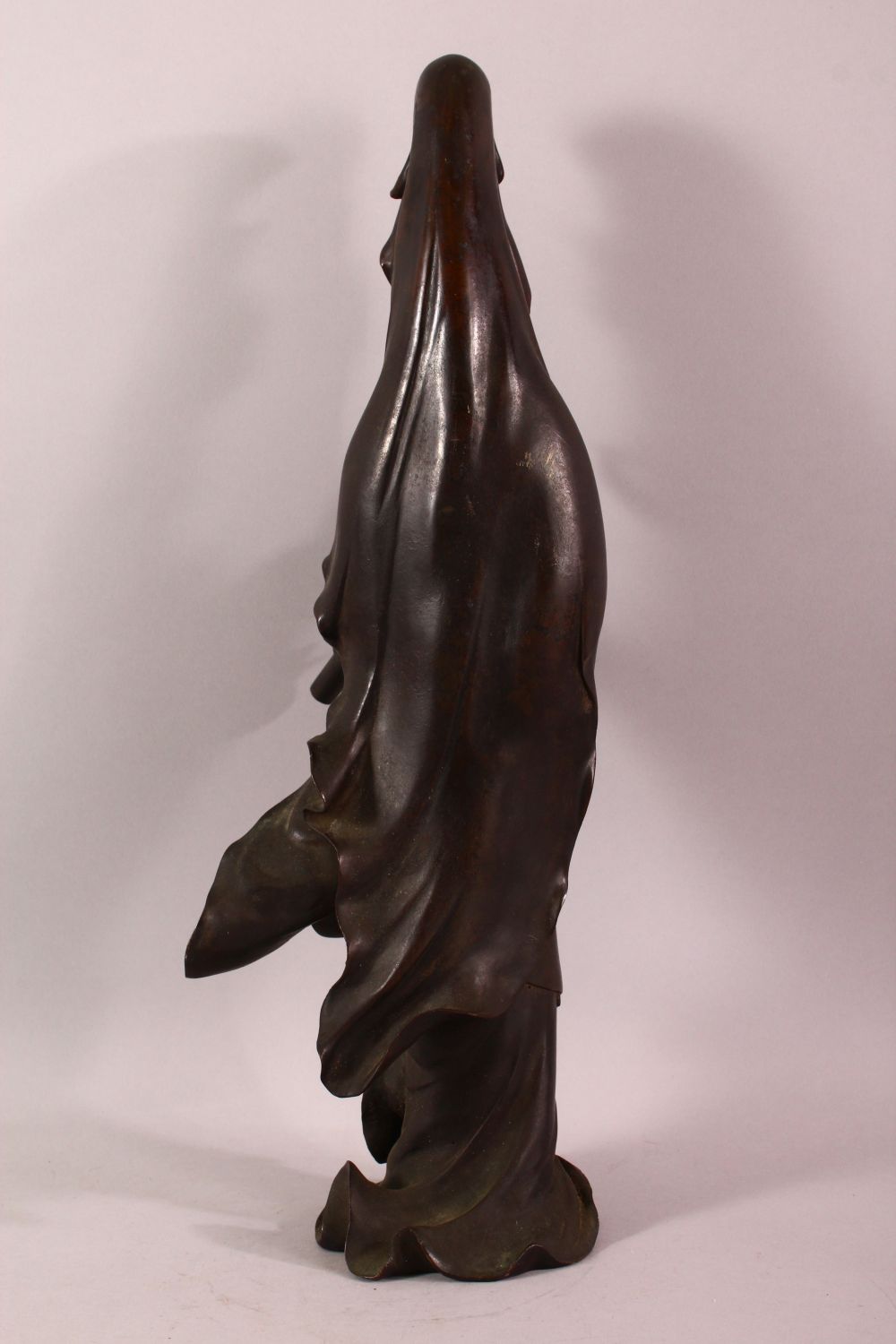 A CHINESE BRONZE FIGURE OF GUANYIN holding a scroll, her other hand raised in a mindfulness gesture, - Image 3 of 8