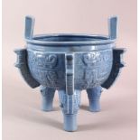 AN UNUSUAL CHINESE CELADON GLAZED BLUE PORCELAIN CENSER, with twin handles, body with archaic