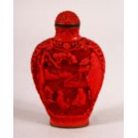 A CHINESE CINNABAR STYLE SNUFF BOTTLE, the base with a seal mark, 7cm