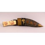 AN EASTERN CARVED BONE HANDLED DAGGER & LEATHER SHEATH, The bone handle carved and stained, the