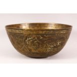 A 19TH / 20TH CENTURY CHINESE CARVED BRONZE DRAGON BOWL - the body incised with dragons amongst