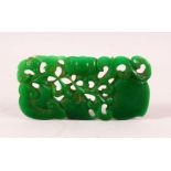 A CHINESE EMERALD COLOUR JADEITE CARVING, the carving depicting fruits, mushroom and vines, 10.5cm x
