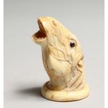 A CARVED BONE HORSE'S HEAD 2.25ins